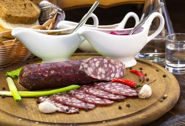 Sausages with vegetables — Stock Photo, Image