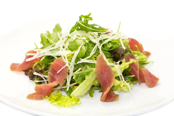 Salad of arugula, tuna and vegetables — Stock Photo, Image