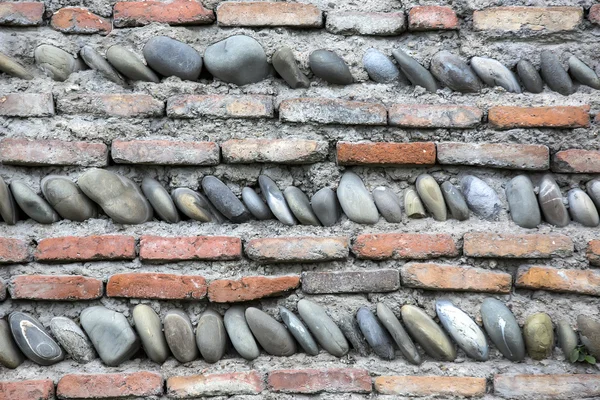 Old brick wall with stones — Stock Photo, Image