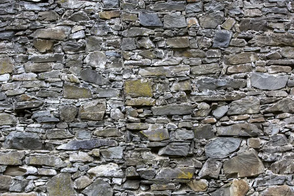 Foto de uma parede de tijolo velho — Fotografia de Stock