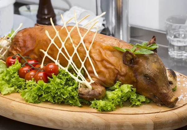 Roasted pig on plate — Stock Photo, Image