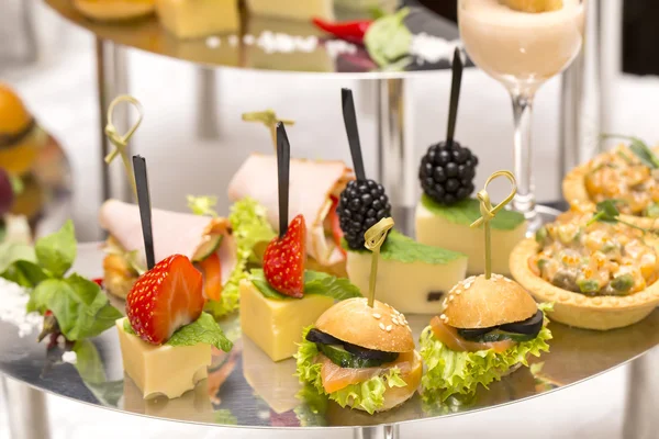 Canapes of cheese, meat and seafood — Stock Photo, Image