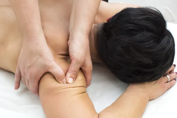 Woman doing massage — Stock Photo, Image