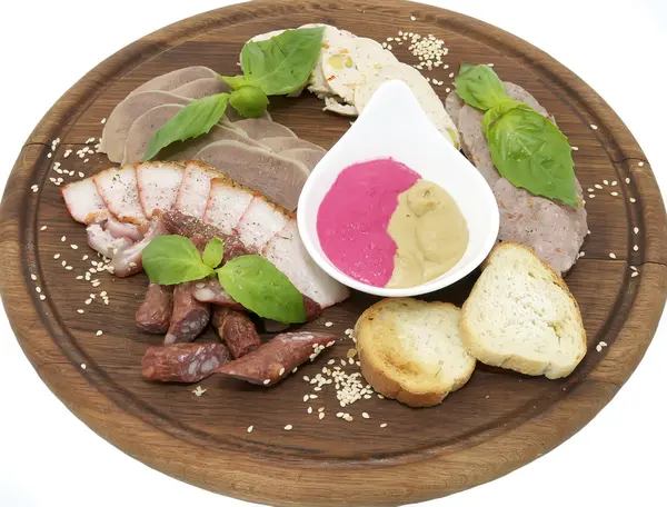 Wooden plate with sausages — Stock Photo, Image