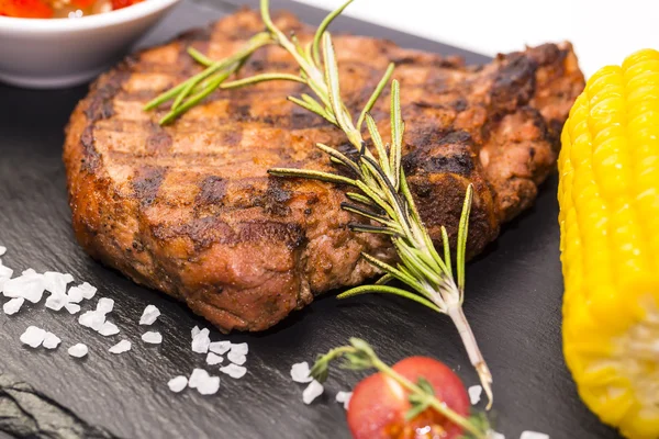 Grilled steak with sauce — Stock Photo, Image