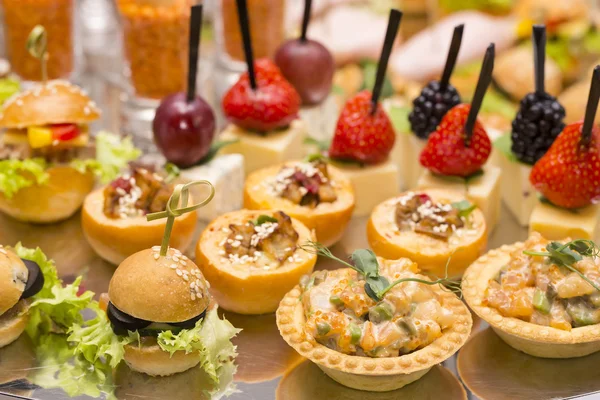 Canapes of cheese, meat and seafood — Stock Photo, Image