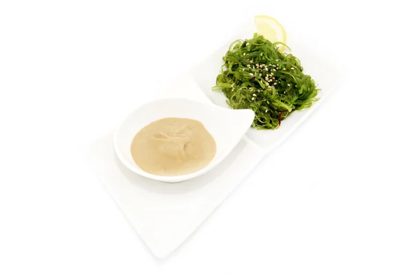 Seaweed salad and sauce — Stock Photo, Image