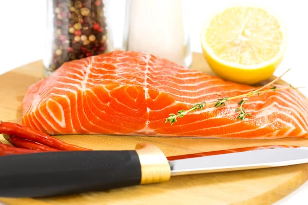 Salmon steaks with knife — Stock Photo, Image