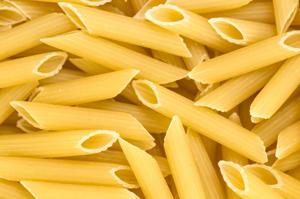 Penne pasta background — Stock Photo, Image