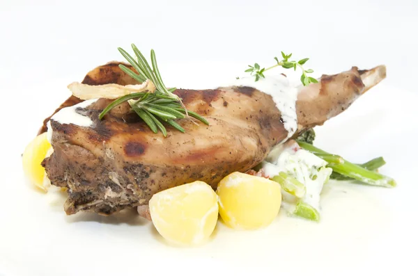 Roasted rabbit meat and potatoes — Stock Photo, Image