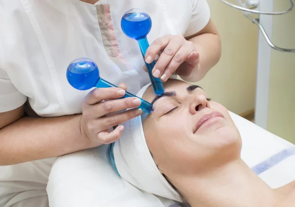 Woman on face massage procedure — Stock Photo, Image