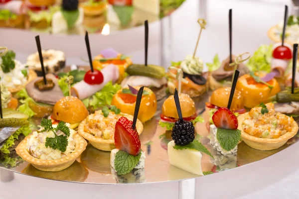 Canapes of cheese, meat and seafood — Stock Photo, Image