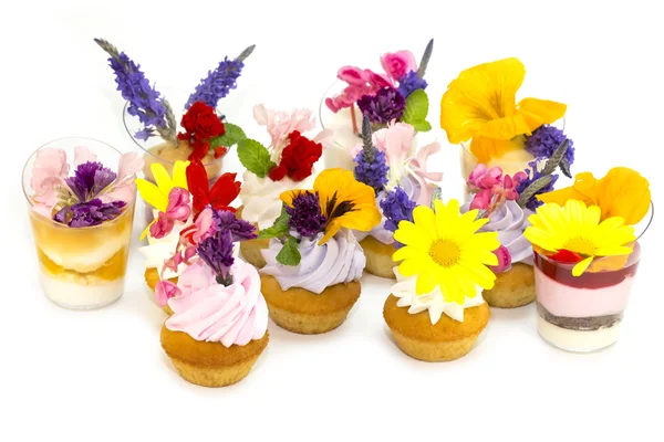 Muffins and canapes with flowers — Stock Photo, Image