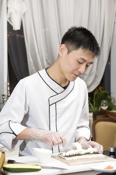 Chef preparing sushi rolls — Stock Photo, Image