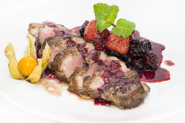 Steak with berry sauce — Stock Photo, Image