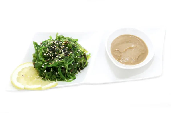 Seaweed salad and sauce — Stock Photo, Image