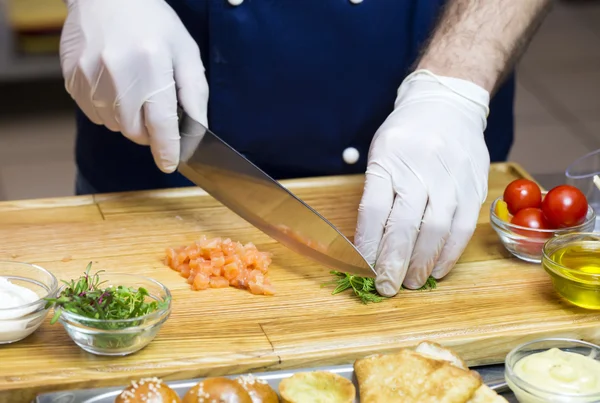 Cook preparing canapes — Stock Photo, Image