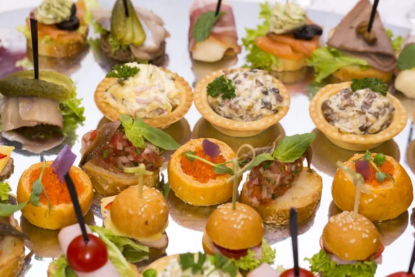 Canapes of cheese, meat and seafood — Stok Foto