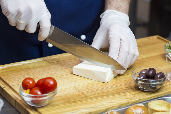 Cook preparing canapes