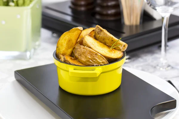 Fried potatoes on a plate — Stock Photo, Image