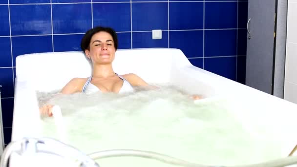 Young woman during hydromassage — Stock Video