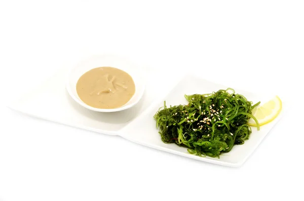 Seaweed salad and sauce — Stock Photo, Image