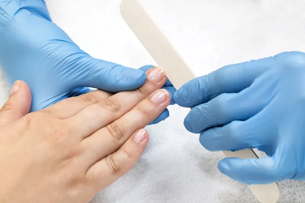 Woman doing manicure close up — Stock Photo, Image