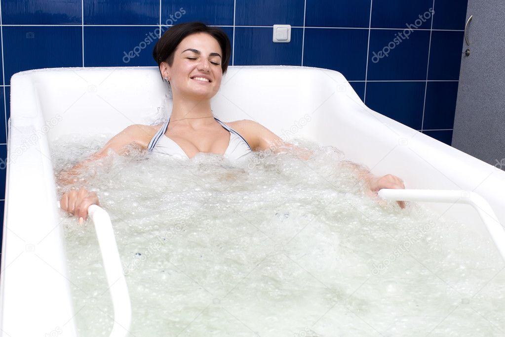 young woman during hydromassage