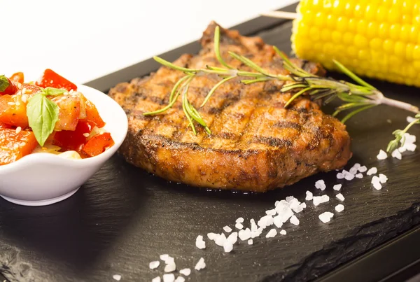 Grilled steak with sauce — Stock Photo, Image