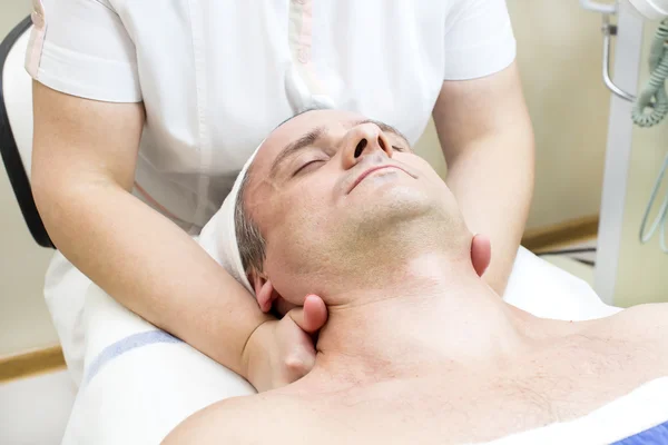 Man during facial treatment — Stock Photo, Image