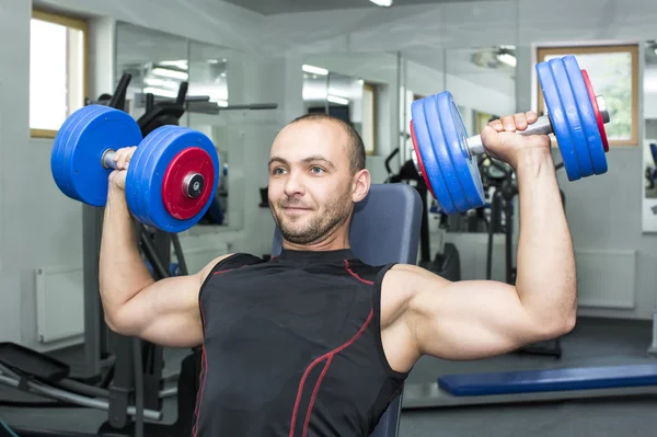 Man training in gym Stock Image