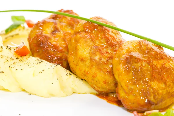 Cutlets fried in carrot sauce — Stock Photo, Image