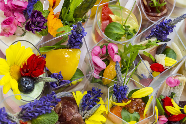 Canapes with edible flowers