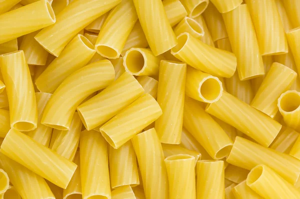 Tortiglioni pasta achtergrond — Stockfoto