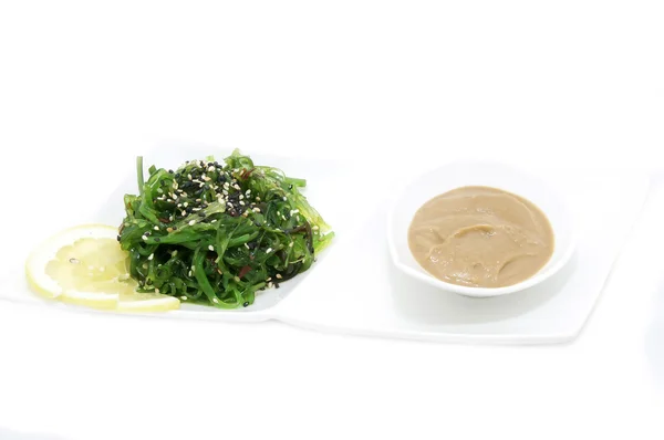 Seaweed salad and sauce — Stock Photo, Image