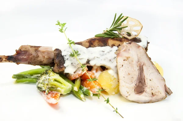 Roasted rabbit meat and potatoes — Stock Photo, Image