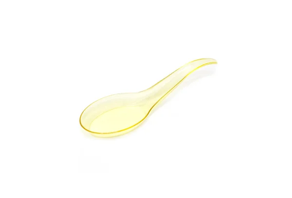 Plastic spoon with colored plastic — Stock Photo, Image
