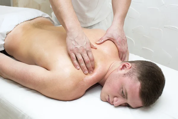 Man doing massage — Stock Photo, Image