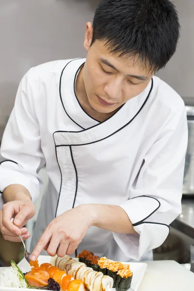 Japanese chef preparing a meal — Stock Photo, Image