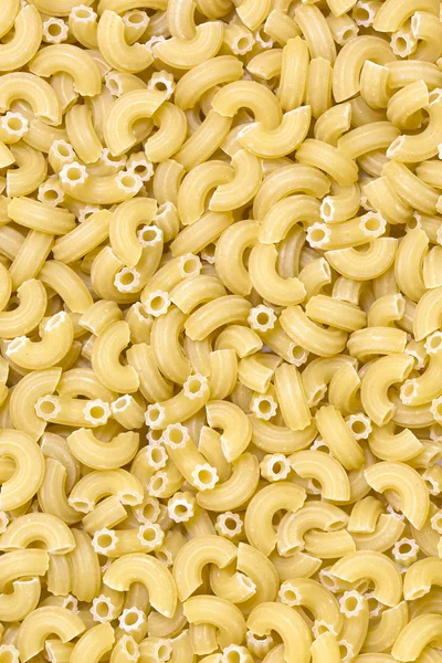 Bakgrund rå pasta — Stockfoto