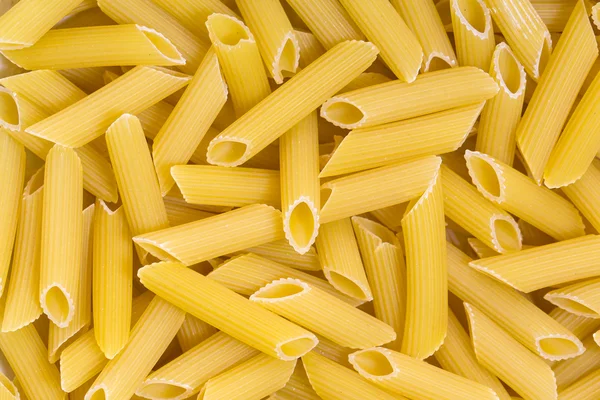 Achtergrond ruwe pasta — Stockfoto
