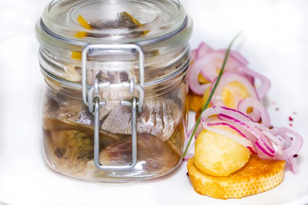 Pickled herring in a glass — Stock Photo, Image