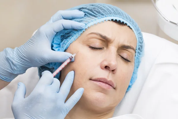 Cosmetic treatment with injection — Stock Photo, Image