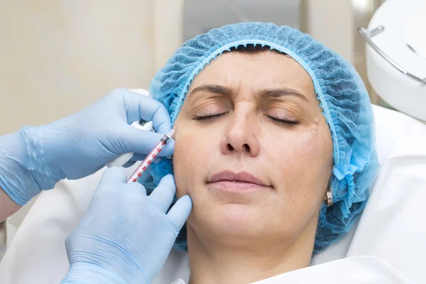 Cosmetic treatment with injection — Stock Photo, Image