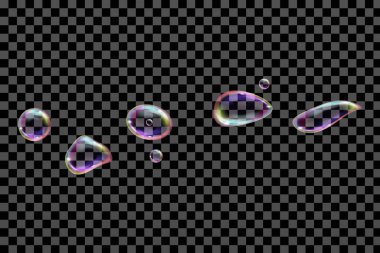 Damalı bir arka planda farklı şekillerde saydam sabun baloncukları uçuyor.