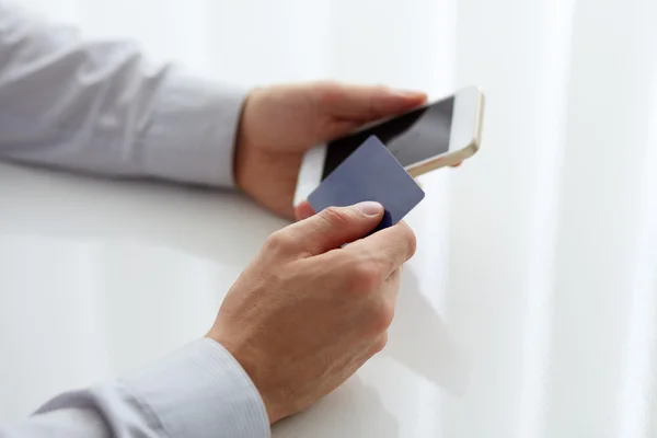 Male hands holding credit card — Stock Photo, Image