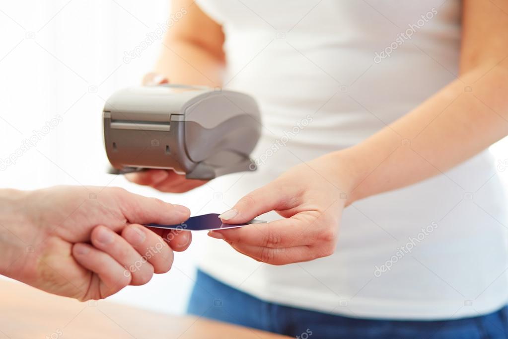 Woman accepts credit card to pay