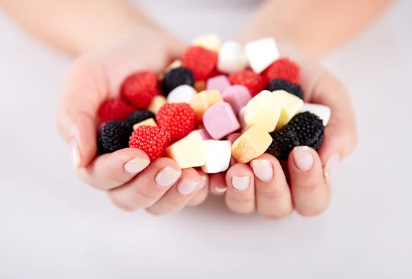 Woman hands holding candles — Stock Photo, Image