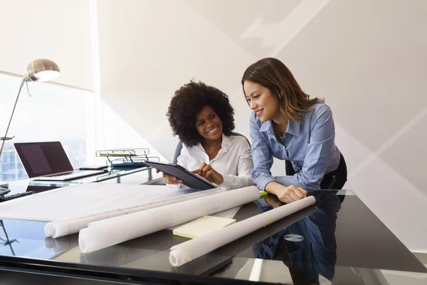 Women Colleagues Architect With Tablet PC And Blueprints — Stok fotoğraf