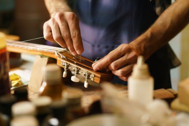 Artisan Lute Maker Fixing Stringed Instrument Replacing Guitar C clipart